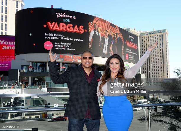 Three-time world champion boxer Fernando Vargas and his wife Martha Vargas pose on the Las Vegas Strip in front of their series billboard on January...