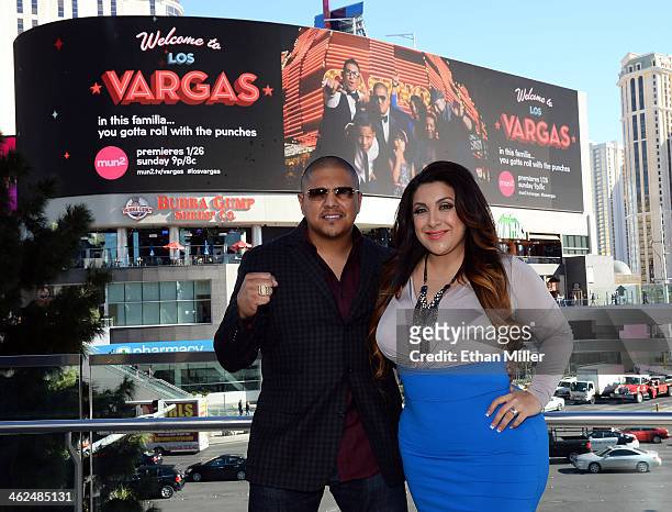 Three-time world champion boxer Fernando Vargas and his wife Martha Vargas pose on the Las Vegas Strip in front of their series billboard on January...