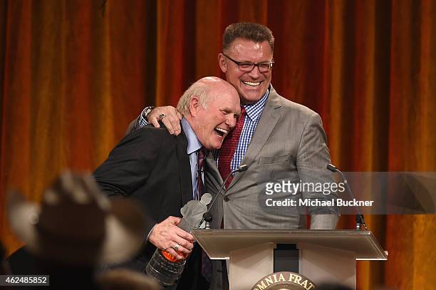 Honoree Terry Bradshaw and NFL analyst Howie Long onstage at the Friars Club Roast of Terry Bradshaw during the ESPN Super Bowl Roast at the Arizona...