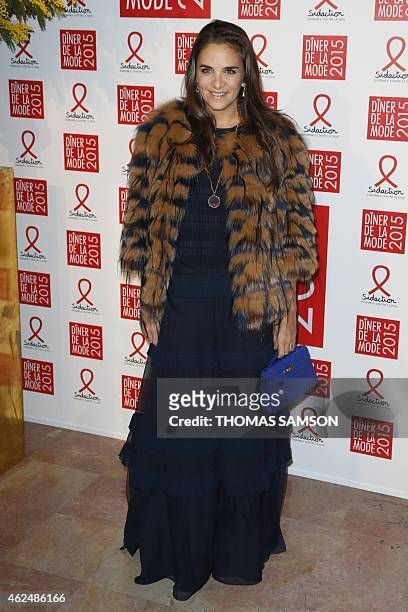 Laure de Broglie poses as she arrives to attend the 2015 Sidaction Gala Dinner, in Paris, on January 29, 2015. AFP PHOTO / THOMAS SAMSON