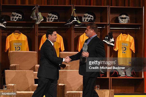Philanthropist Eric Crown accepts award from Arizona Governor Doug Ducey onstage at the Friars Club Roast of Terry Bradshaw during the ESPN Super...