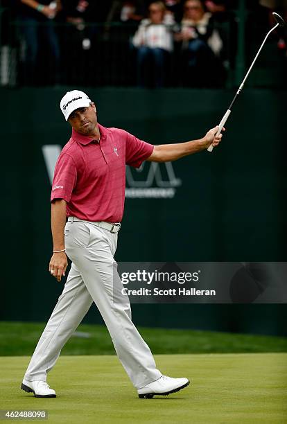 Ryan Palmer celebrates after sinking a birdie putt on the 16th green during the first round of the Waste Management Phoenix Open at TPC Scottsdale on...