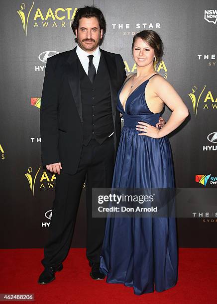 Lachy Hulme and guest arrive at the 4th AACTA Awards Ceremony at The Star on January 29, 2015 in Sydney, Australia.