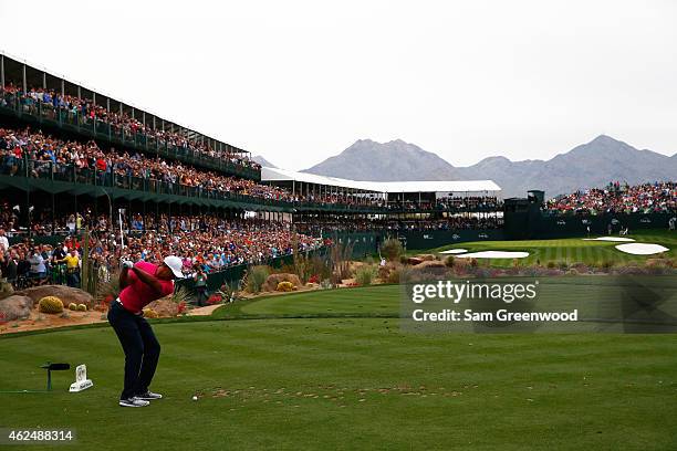 Tiger Woods hits a tee shot on the 16th hole during the first round of the Waste Management Phoenix Open at TPC Scottsdale on January 29, 2015 in...