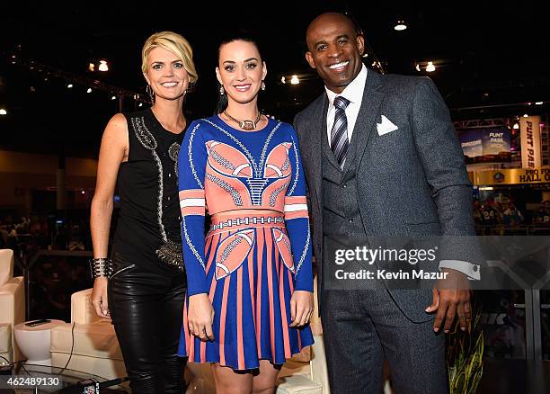 Sportscaster Melissa Stark, recording artist Katy Perry and former NFL player and sports analyst Deion Sanders attend the NFL Experience on January...