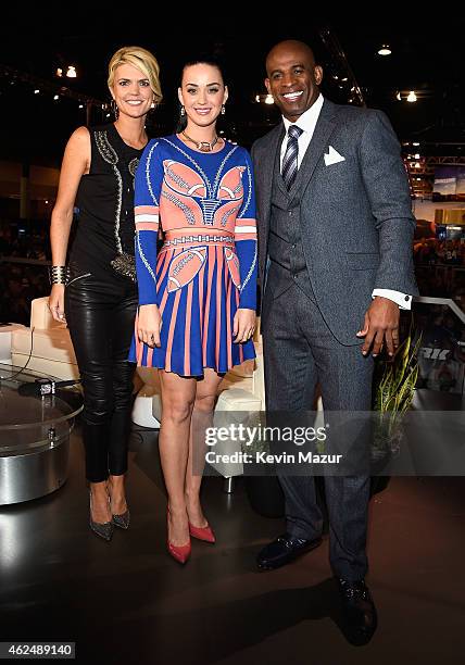 Sportscaster Melissa Stark, recording artist Katy Perry and former NFL player and sports analyst Deion Sanders attend the NFL Experience on January...