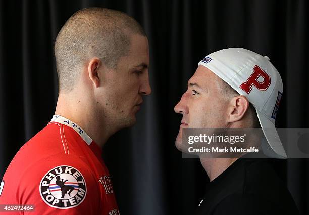 Paul Gallen and Randall Rayment face up during the weigh in ahead of Footy Show Fight Night at Allphones Arena on January 30, 2015 in Sydney,...