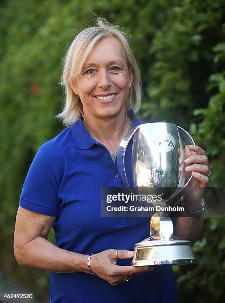 Martina Navratilova poses with the WTA Finals doubles trophy that bears her name as the Woman's Tennis Association announced she would return as an...