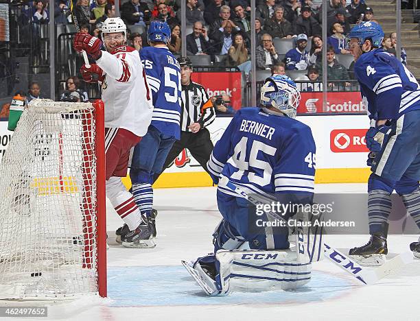 Martin Hanzal of the Arizona Coyotes celebrates a goal by teammate Sam Gagner against Jonathan Bernier of the Toronto Maple Leafs during an NHL game...