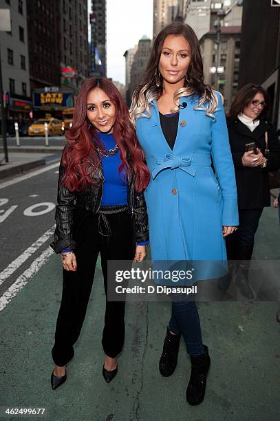 Nicole "Snooki" Polizzi and Jenni "JWoww" Farley visit "Extra" in Times Square on January 13, 2014 in New York City.