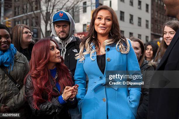 Nicole "Snooki" Polizzi and Jenni "JWoww" Farley visit "Extra" in Times Square on January 13, 2014 in New York City.