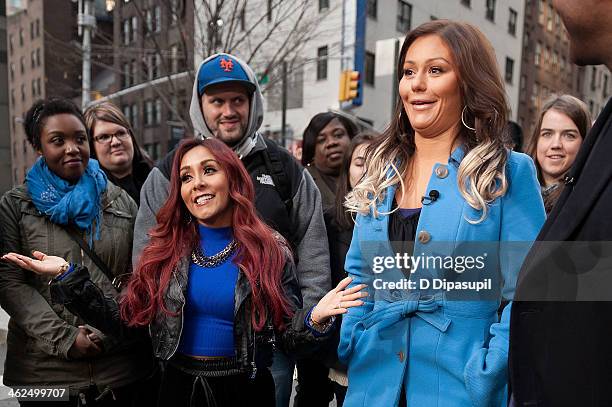 Nicole "Snooki" Polizzi and Jenni "JWoww" Farley visit "Extra" in Times Square on January 13, 2014 in New York City.