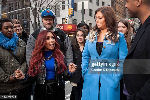 Nicole "Snooki" Polizzi and Jenni "JWoww" Farley visit "Extra" in Times Square on January 13, 2014 in New York City.