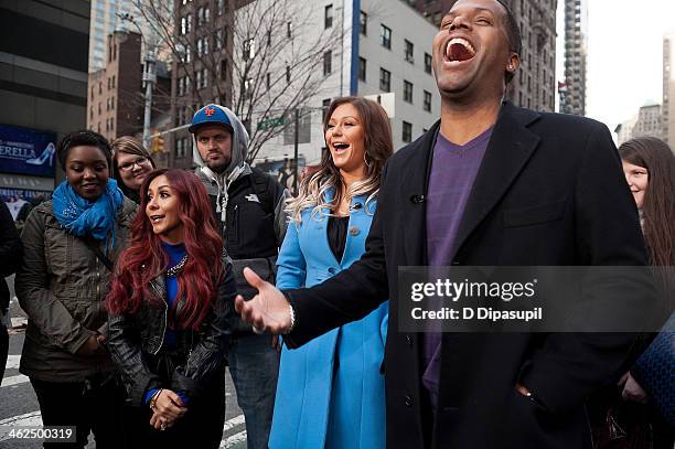 Calloway interviews Nicole "Snooki" Polizzi and Jenni "JWoww" Farley during their visit to "Extra" in Times Square on January 13, 2014 in New York...