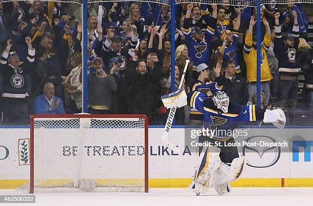 St. Louis Blues goaltender Brian Elliott reacts after making a save to seal a 5-4 shootout win against the Nashville Predators on Thursday, Jan. 29...