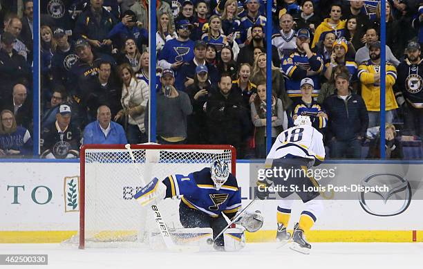 St. Louis Blues goaltender Brian Elliott makes a save against the Nashville Predators' James Neal to seal a 5-4 win in the shootout on Thursday, Jan....