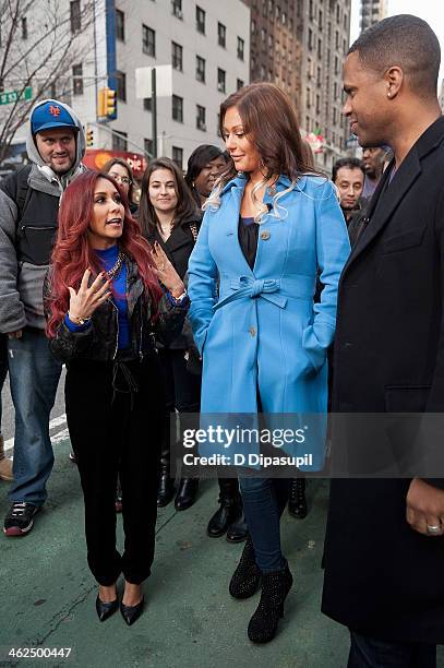 Calloway interviews Nicole "Snooki" Polizzi and Jenni "JWoww" Farley during their visit to "Extra" in Times Square on January 13, 2014 in New York...