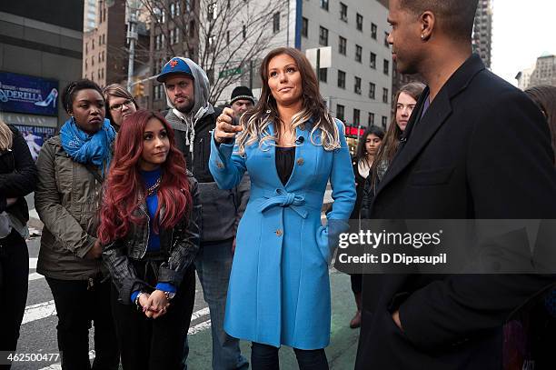 Calloway interviews Nicole "Snooki" Polizzi and Jenni "JWoww" Farley during their visit to "Extra" in Times Square on January 13, 2014 in New York...