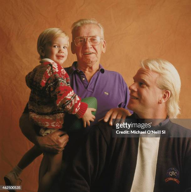 Former football player Boomer Esiason is photographed with son Gunnar and father Norman for Sports Illustrated on September 20, 1993 in New York...