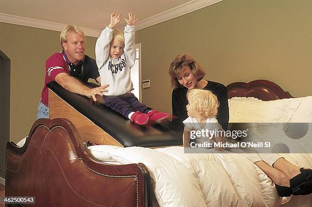 Former football player Boomer Esiason is photographed with wife Cheryl, son Gunnar and daughter Sydney for Sports Illustrated on September 20, 1993...