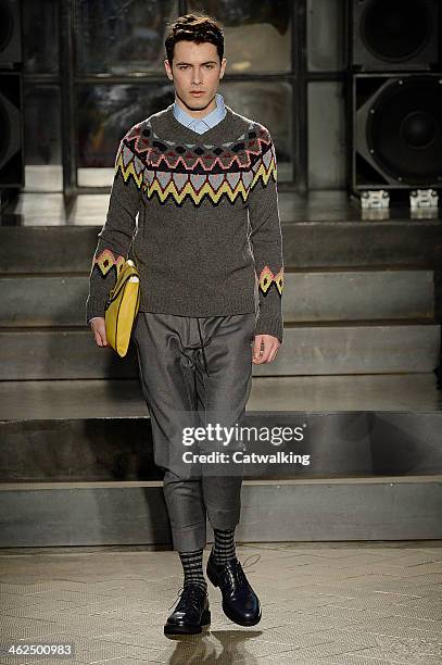 Model walks the runway at the Antonio Marras Autumn Winter 2014 fashion show during Milan Menswear Fashion Week on January 13, 2014 in Milan, Italy.