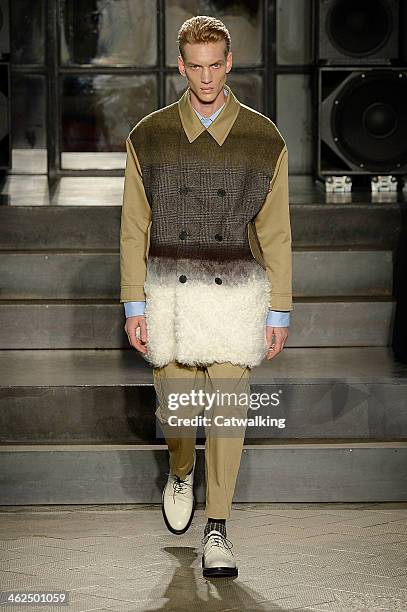 Model walks the runway at the Antonio Marras Autumn Winter 2014 fashion show during Milan Menswear Fashion Week on January 13, 2014 in Milan, Italy.