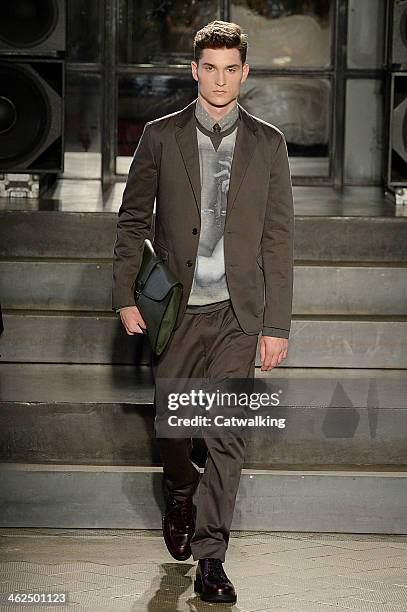 Model walks the runway at the Antonio Marras Autumn Winter 2014 fashion show during Milan Menswear Fashion Week on January 13, 2014 in Milan, Italy.