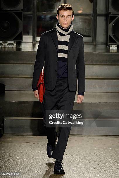 Model walks the runway at the Antonio Marras Autumn Winter 2014 fashion show during Milan Menswear Fashion Week on January 13, 2014 in Milan, Italy.