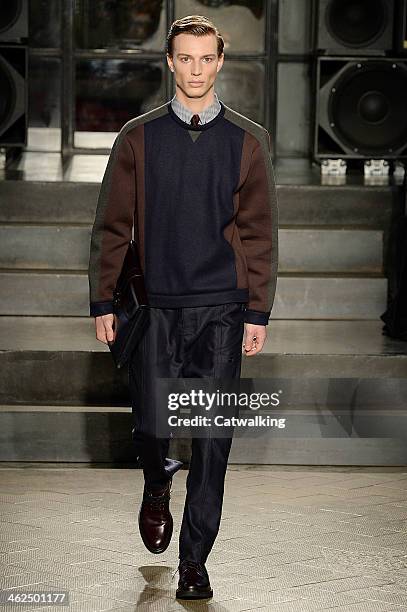 Model walks the runway at the Antonio Marras Autumn Winter 2014 fashion show during Milan Menswear Fashion Week on January 13, 2014 in Milan, Italy.