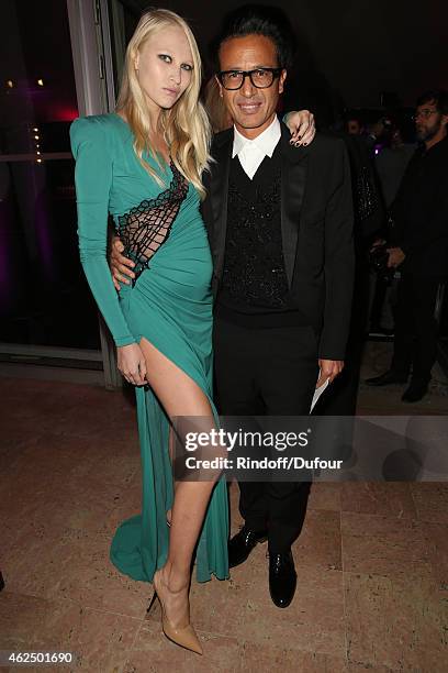 Yulia Lobova and Omar Harfouch attend the Sidaction Gala Dinner 2015 at Pavillon d'Armenonville on January 29, 2015 in Paris, France.