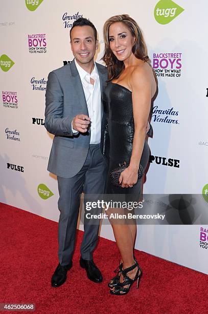 Singer Howie Dorough of the Backstreet Boys and wife Leigh Boniello attend the premiere of Gravitas Ventures' "Backstreet Boys: Show 'Em What You're...