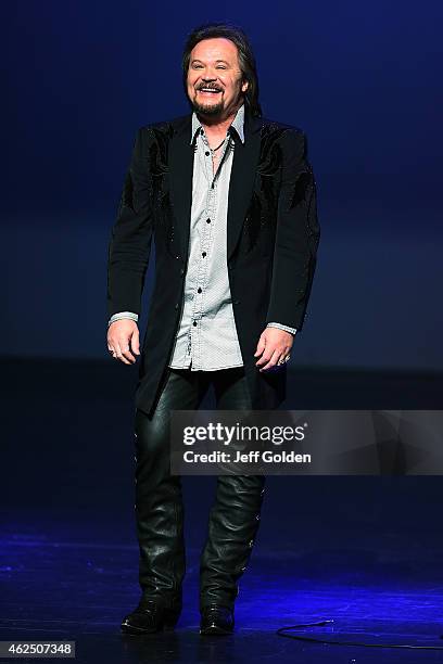 Travis Tritt greets the audience as he takes the stage to perform on his 'An Acoustic Evening With Travis Tritt' Tour at Fred Kavli Theatre on...