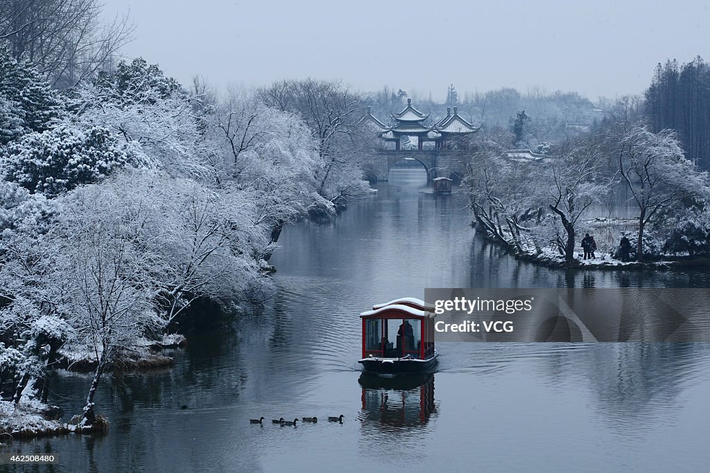 Slender West Lake Covered In Silvery White