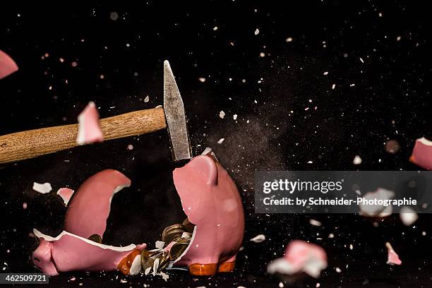 "pig-frag" - smashed piggy bank stock pictures, royalty-free photos & images
