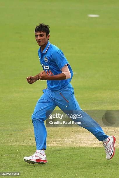 Axar Patel of India celebrates the wicket of Moeen Ali of England during the One Day International match between England and India at the WACA on...