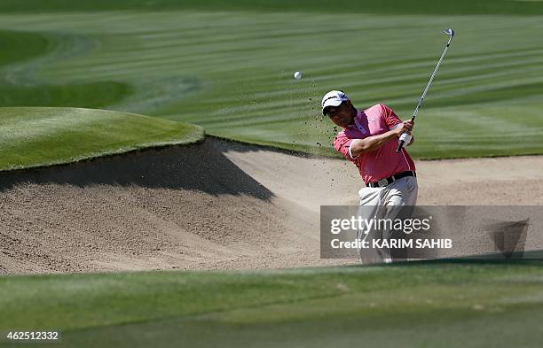 Jason Barnes of England plays a shot during the second round of the 2015 Omega Dubai Desert Classic on January 30, 2015 in Dubai, United Arab...