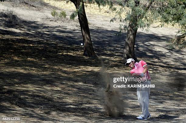 Jason Barnes of England plays a shot during the second round of the 2015 Omega Dubai Desert Classic on January 30, 2015 in Dubai, United Arab...