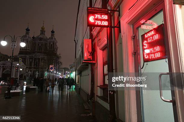 Red lights indicate euro ruble exchange rates outside a currency exchange store in Moscow, Russia, on Thursday, Jan. 29, 2015. European Union...