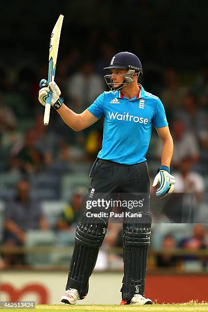 Jos Buttler of England celebrates his half century during the One Day International match between England and India at WACA on January 30, 2015 in...