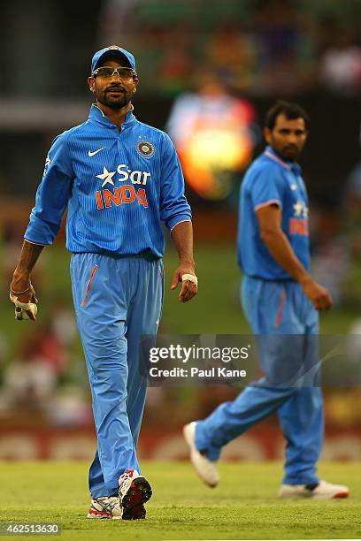 Shikhar Dhawan of India watches a replay on the big screen during the One Day International match between England and India at the WACA on January...