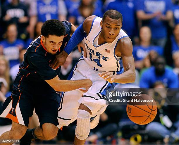 London Perrantes of the Virginia Cavaliers battles for a loose ball with Rasheed Sulaimon of the Duke Blue Devils during a game at Cameron Indoor...