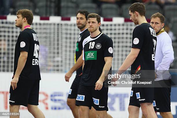 Paul Drux, Michael Mueller, Martin Strobel, Hendrik Pekeler and Steffen Weinhold of Germany look dejected after the placement round between Croatia...