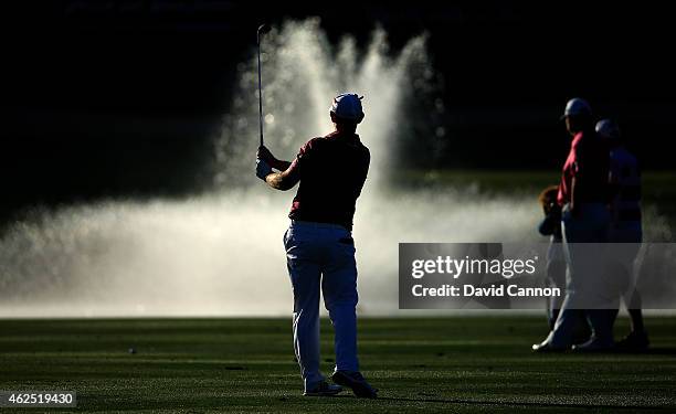 Stephen Gallacher of Scotland plays his third shot on the par 5, 18th hole during the second round of the 2015 Omega Dubai Desert Classic on the...