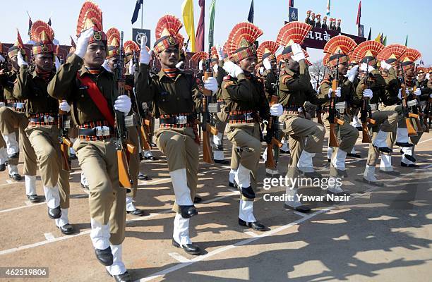 Indian Border Security Force soldiers salute during their passing out parade on January 30, 2015 in Humhama, on the outskirts of Srinagar, the summer...