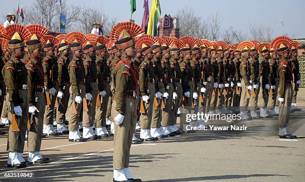 Indian Border Security Force soldiers stand in formation during their passing out parade on January 30, 2015 in Humhama, on the outskirts of...