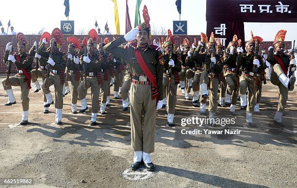 Indian Border Security Force soldiers salute during their passing out parade on January 30, 2015 in Humhama, on the outskirts of Srinagar, the summer...