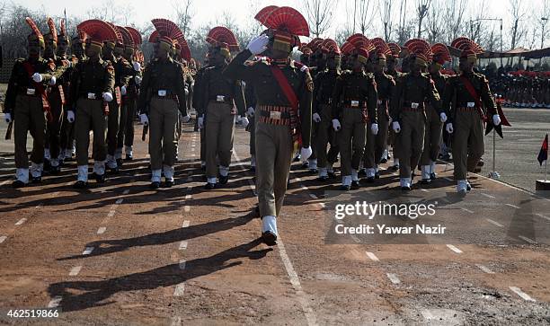 Indian Border Security Force soldiers salute during their passing out parade on January 30, 2015 in Humhama, on the outskirts of Srinagar, the summer...