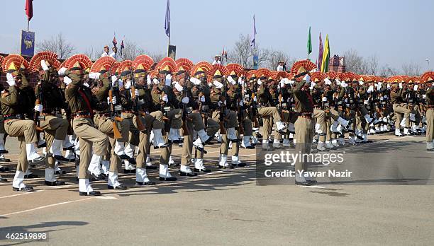 Indian Border Security Force soldiers salute during their passing out parade on January 30, 2015 in Humhama, on the outskirts of Srinagar, the summer...