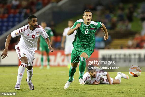 Ali Adnan Kadhim of Iraq controls the ball ahead of United Arab Emirates defence during the Third Place 2015 Asian Cup match between Iraq and the...