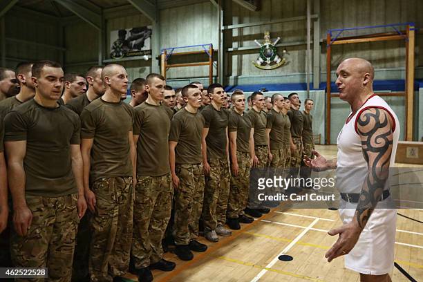 Recruits are addressed by a physical training instructor at the Commando Training Centre Royal Marines on November 18, 2014 in Lympstone, United...